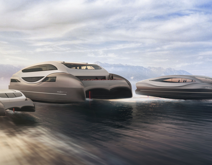Trois bateaux futuristes du Groupe E flottant au-dessus de l'eau grâce à des hydrofoils. Ces navires, de tailles différentes, présentent des lignes modernes, aérodynamiques et des fenêtres panoramiques, symbolisant l'engagement du Groupe E pour l'innovation et la technologie de pointe dans le domaine des transports. Ils évoluent silencieusement sur un lac entouré de montagnes, avec un ciel légèrement nuageux en arrière-plan, illustrant la vision durable du Groupe E pour des solutions énergétiques modernes.