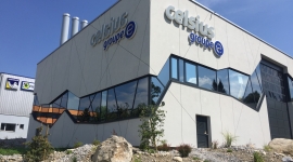 Guin – Düdingen / FR Centrale de chauffage à bois/gaz naturel avec réseau de chauffage à distance